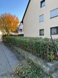 Rasenfriseur Team bei der Arbeit